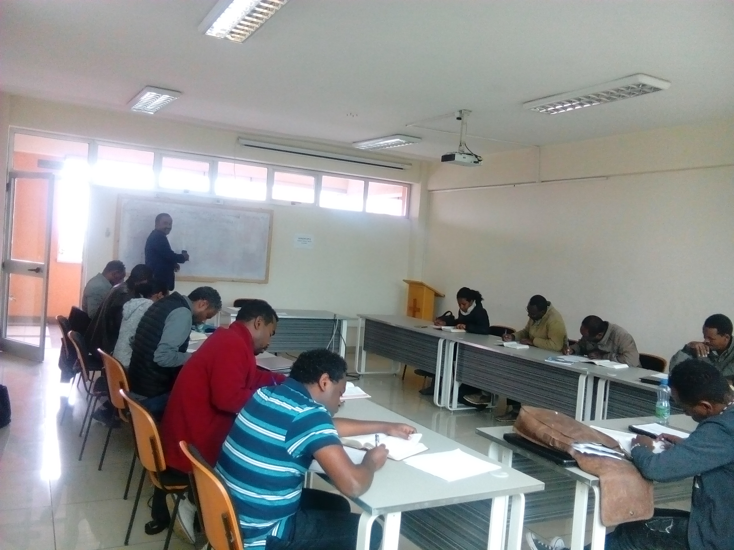Bekele teaching.