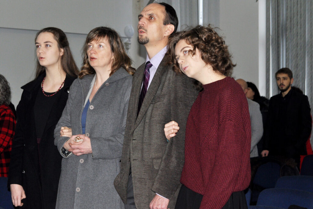 Oleksandr, with his wife Tanya and daughters Olesia and Taia, at his induction.