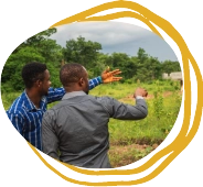 Two men looking over a field